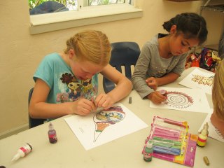 05-Shyamamohini and Shivani work on an arts and crafts project