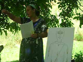 08-Damayanti Didi leads a class about wearing tilak