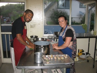 07 In the kitchen Saki Prabhu helps Rasa Rajani Didi prepare fresh spring rolls for the evening offering